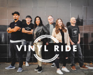 Photo of the Band Vinyl Ride with their logo